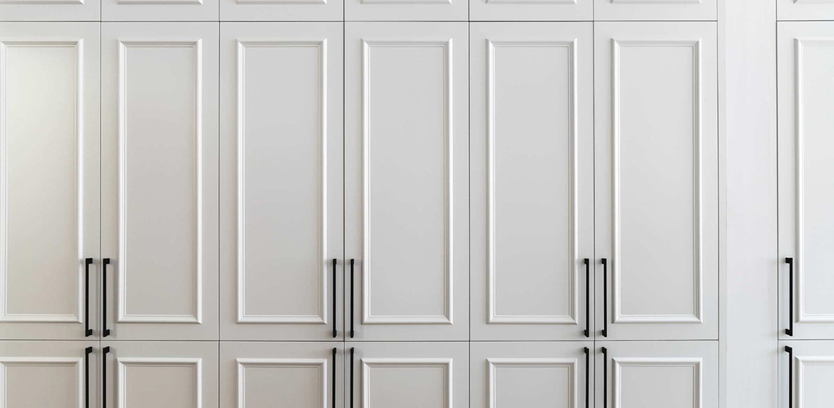 white wardrobe with mirror and drawers