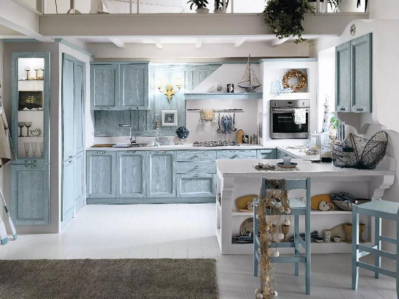 blue kitchen cabinets with glass door